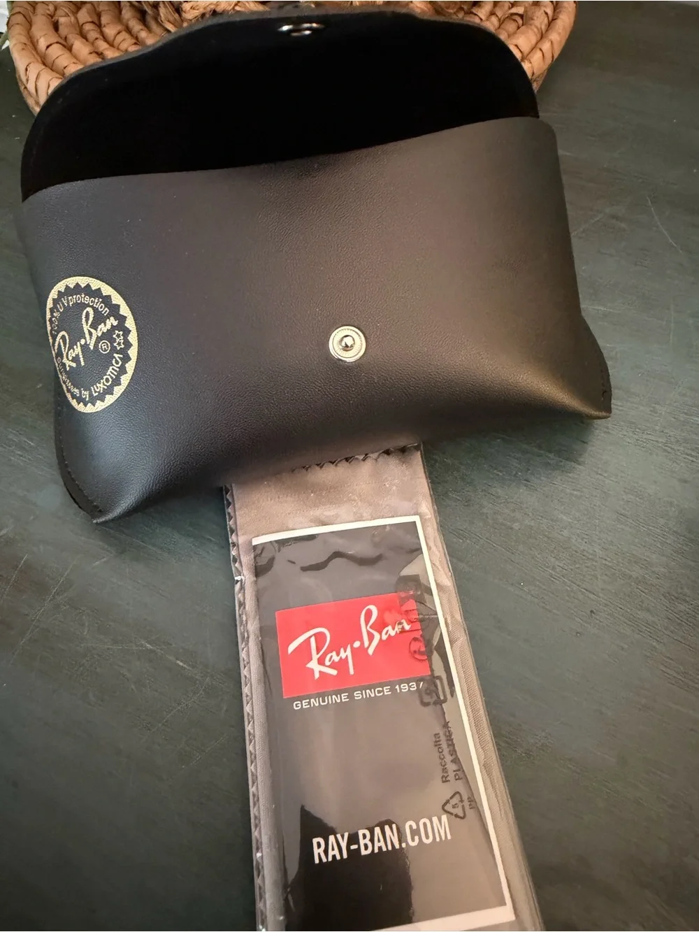 Ray-Ban Sunglasses case with signature gold snap closure. Glass cleaning cloth